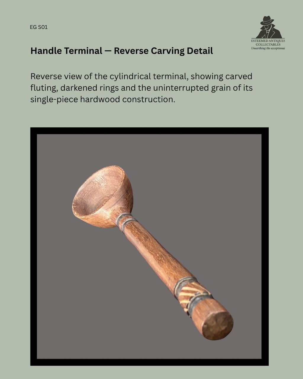 Reverse detail of a Zulu-attributed ukhezo hardwood serving spoon, showing the cylindrical handle terminal with carved fluting, darkened rings and continuous single-piece construction.