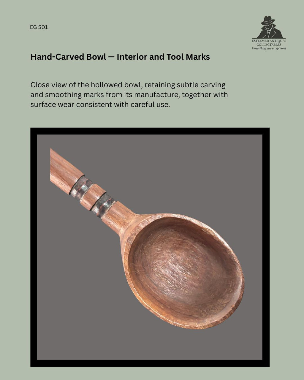 Interior view of the hand-carved bowl of a Zulu-attributed ukhezo wooden serving spoon, showing hollowing and smoothing marks, surface wear and metal bands around the handle.