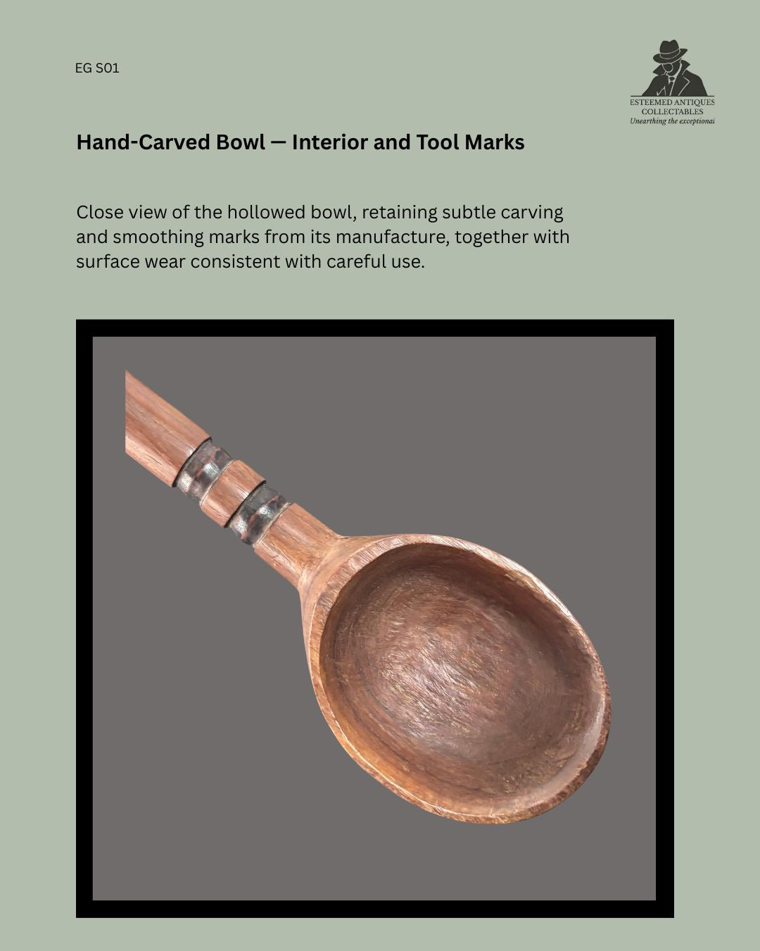 Interior view of the hand-carved bowl of a Zulu-attributed ukhezo wooden serving spoon, showing hollowing and smoothing marks, surface wear and metal bands around the handle.