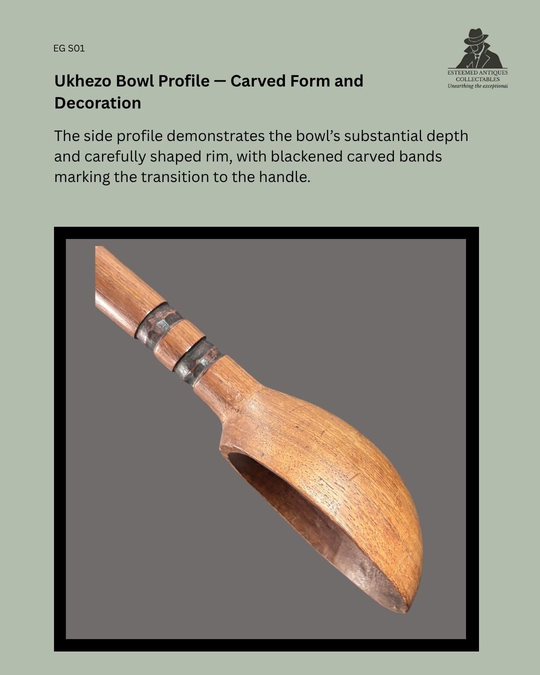 Side profile of a Zulu ukhezo hand-carved wooden serving spoon, showing the deep shaped bowl and blackened carved bands at the handle junction.